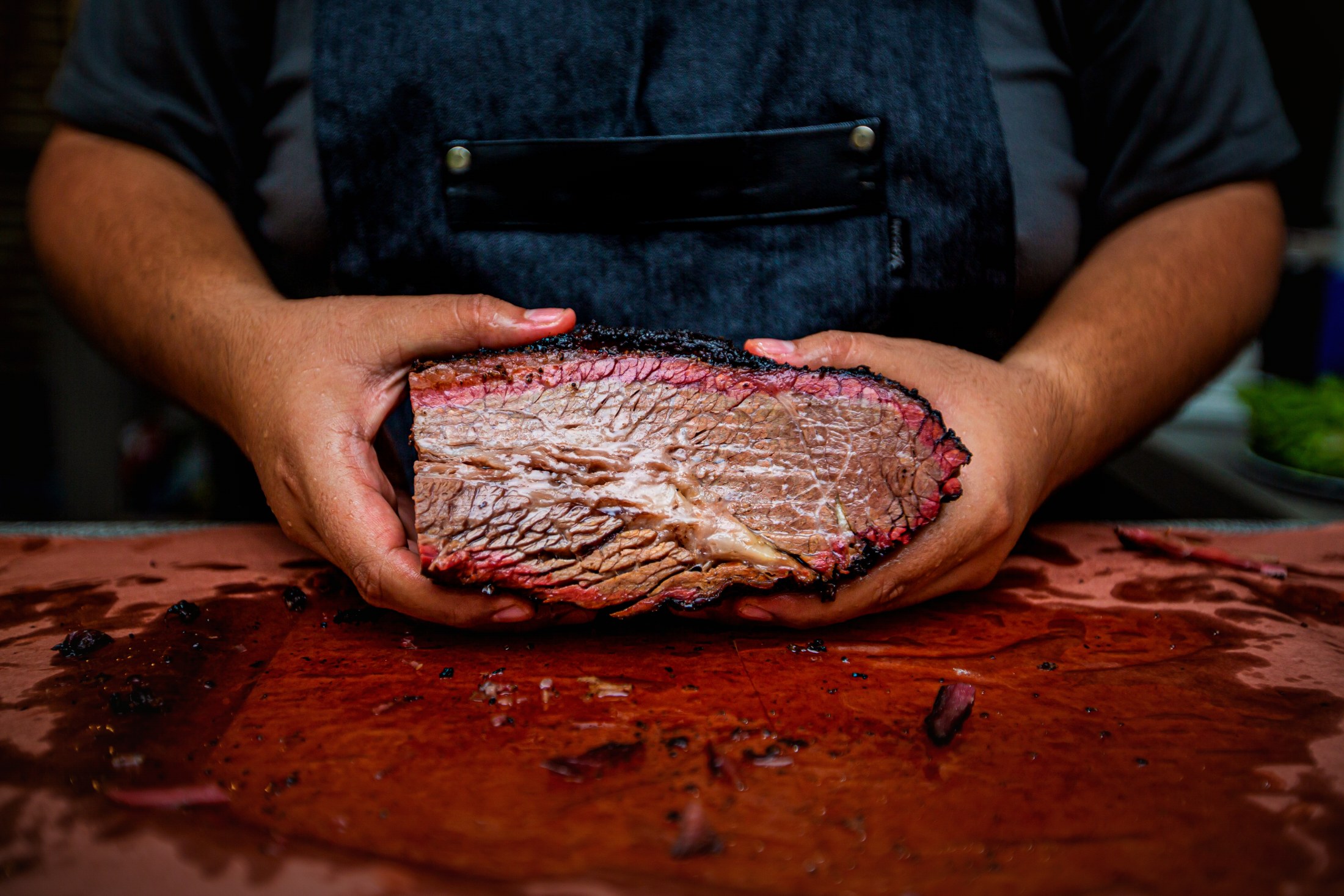 Smoked brisket, sliced to show the smoke ring
