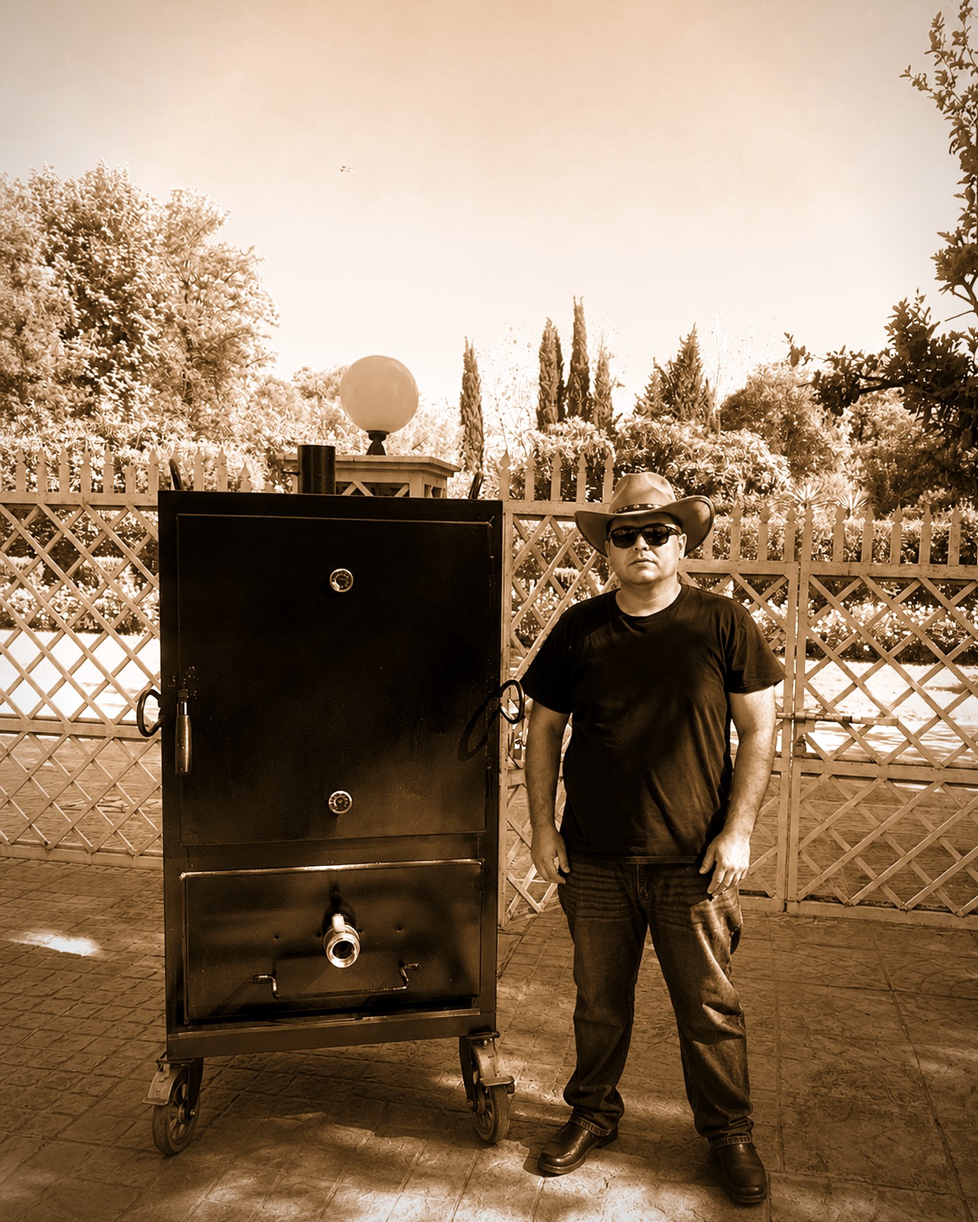 Syed Waleed beside his smoker